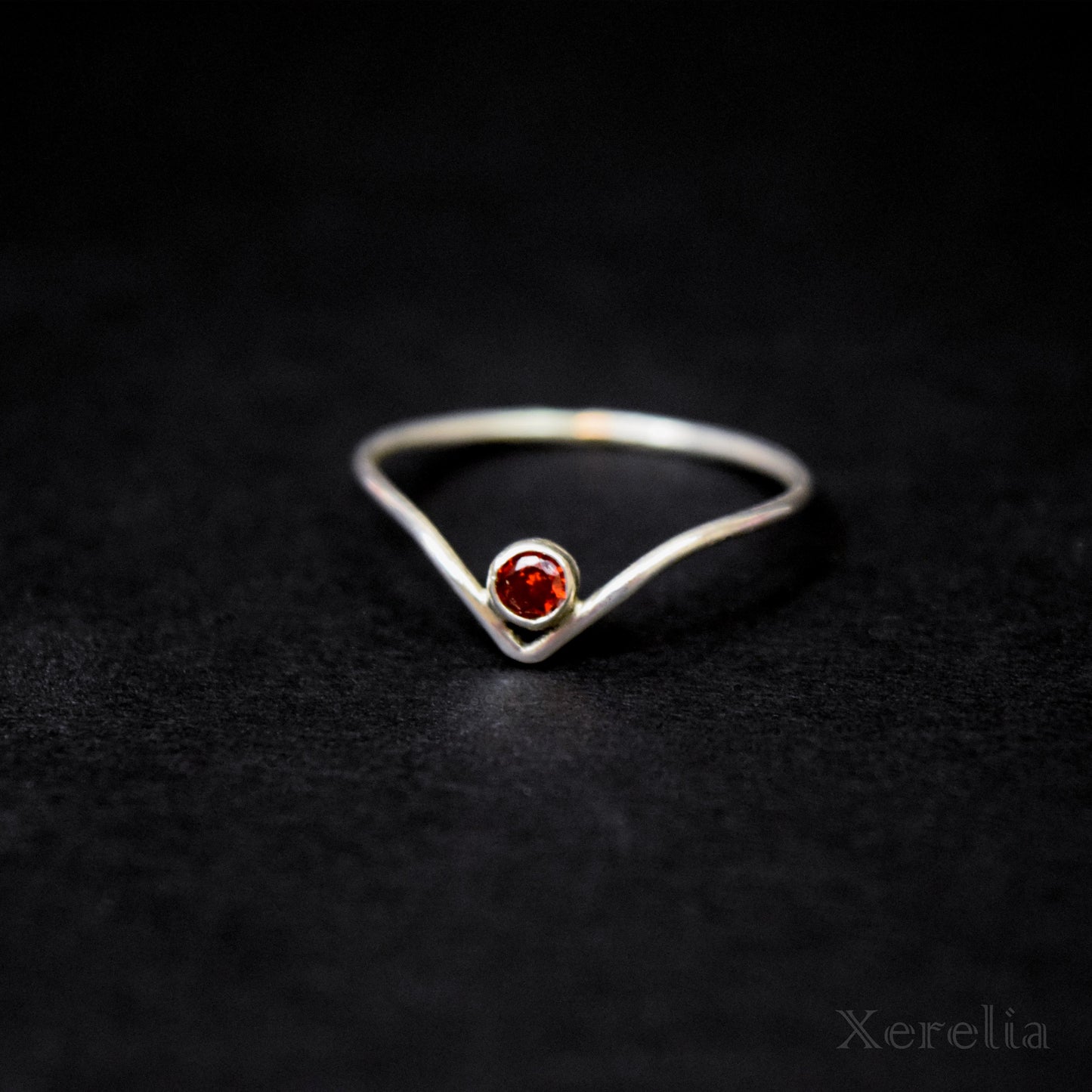 Red Faceted Gem Silver V Ring